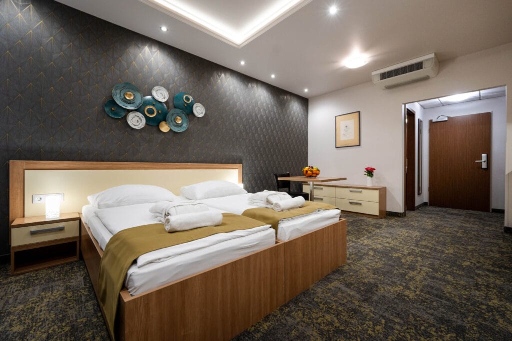 Szobák és apartmanok 6 hotel garzon plaza gyor standard apartman franciaagyas haloter
